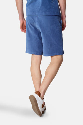 Blauwe short van Le Fabuleux Marcel de Bruxelles, corduroy textuur, te zien van achteren.