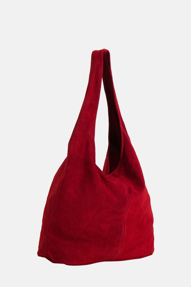 Sac à main rouge de Le Fabuleux Marcel de Bruxelles, avec une texture en suède douce.