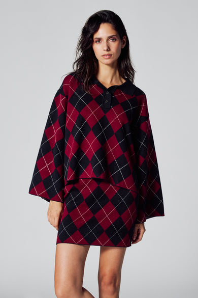 Sweat-shirt multicolore de Le Fabuleux Marcel de Bruxelles avec motif à carreaux, col polo et minirok coordonné.