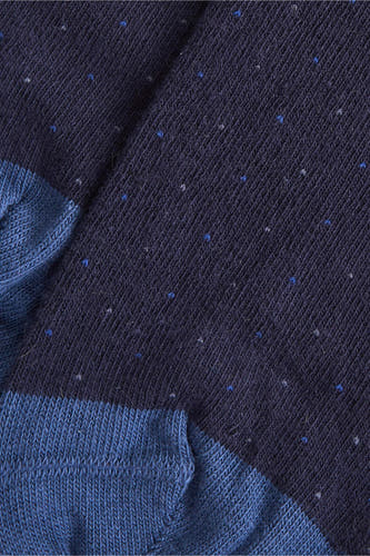 Chaussettes bleues de Le Fabuleux Marcel de Bruxelles avec un motif à points subtil et différentes teintes de bleu.