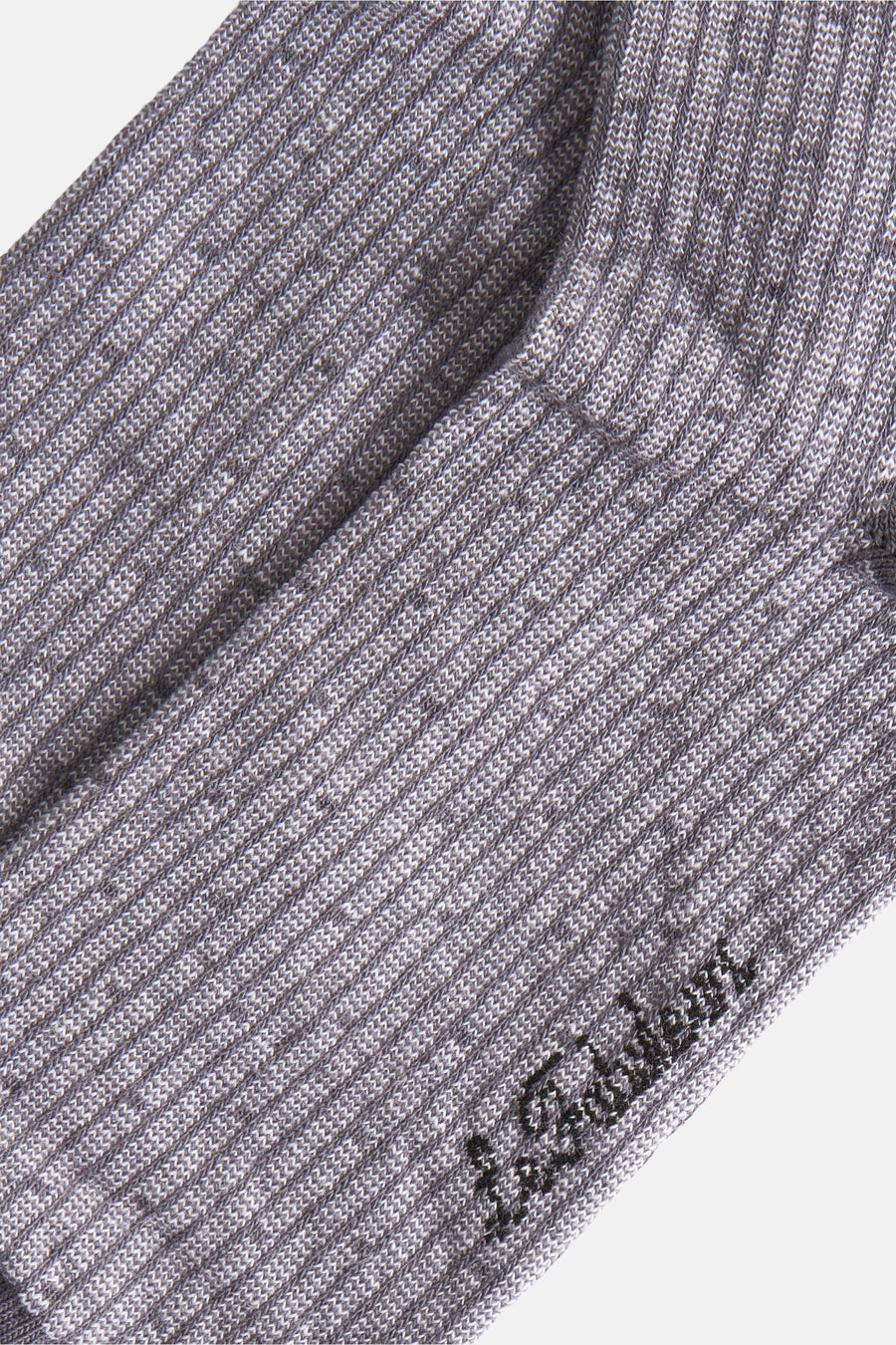 Chaussettes grises de Le Fabuleux Marcel de Bruxelles, avec structure en côtes et un logo brodé.