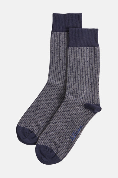 Chaussettes bleues de Le Fabuleux Marcel de Bruxelles, avec des rayures verticales et de petits carrés.