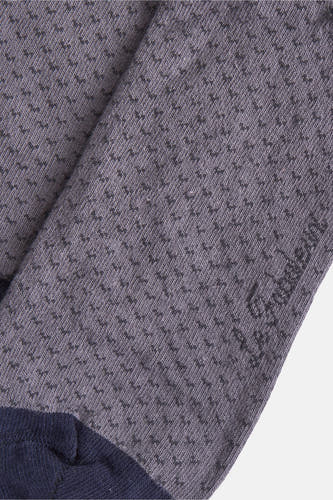 Chaussettes grises de Le Fabuleux Marcel de Bruxelles, avec un fin motif géométrique et une bordure bleu marine.