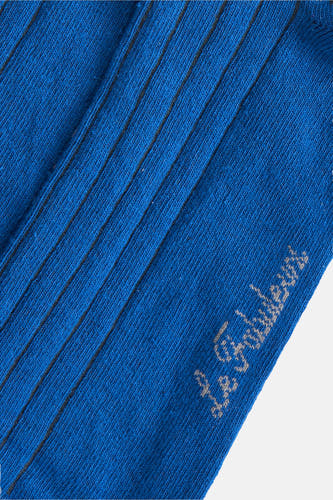 Chaussettes bleues de Le Fabuleux Marcel de Bruxelles, avec des rayures subtiles et un logo sur le côté.