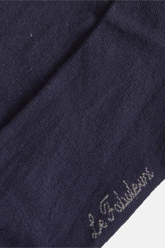 Chaussettes bleues de Le Fabuleux Marcel de Bruxelles, avec une subtile impression de texte sur le côté.