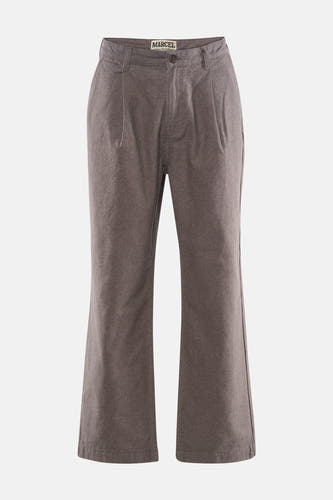 Pantalon marron de couleur de Le Fabuleux Marcel de Bruxelles, avec des plis à l'avant et des jambes larges.