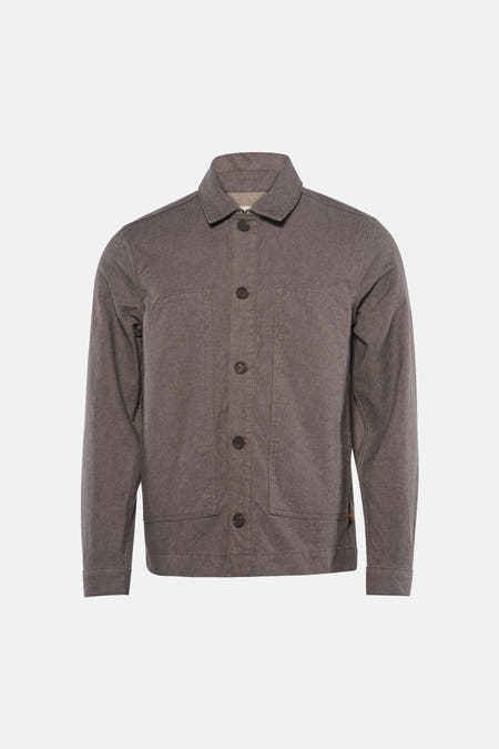 Veste courte marron de Le Fabuleux Marcel de Bruxelles, avec fermeture à boutons et poches plaquées.