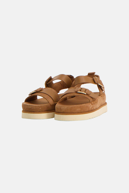 Sandales marron de Le Fabuleux Marcel de Bruxelles, vues de dos, avec une semelle épaisse et des brides réglables.