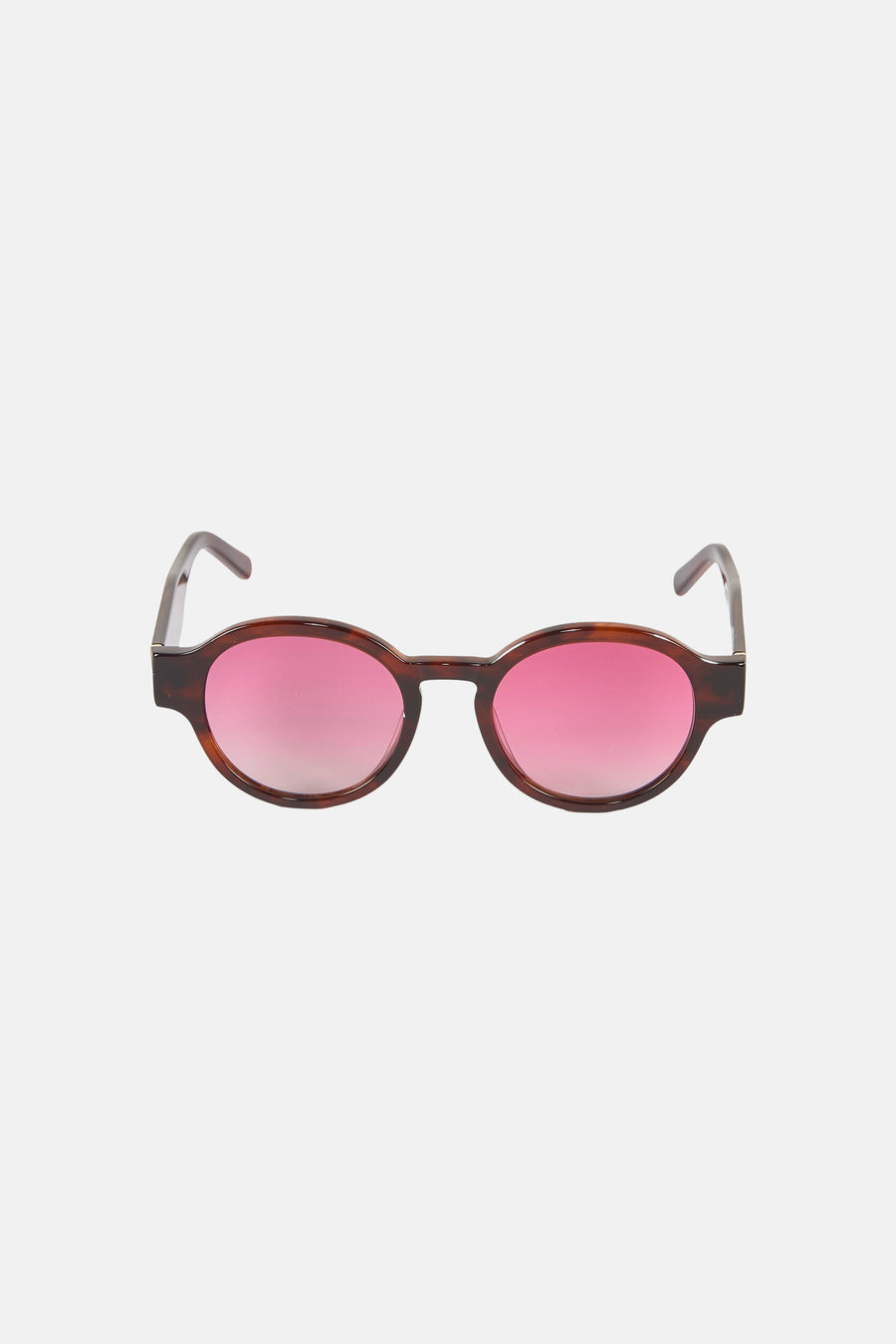 Lunettes de soleil marron de Le Fabuleux Marcel de Bruxelles, avec verres roses et motif écaille de tortue sur la monture.