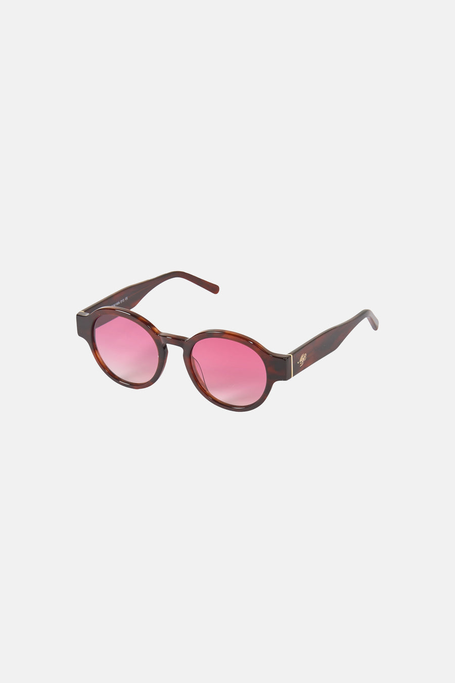 Bruine zonnebril van Le Fabuleux Marcel de Bruxelles, met roze glazen en een schildpadmotief op het montuur.