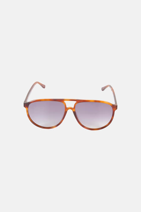 Lunettes de soleil marron de Le Fabuleux Marcel de Bruxelles, avec monture écaille de tortue et verres à dégradé.