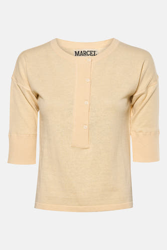 Veste écru avec col rond de Le Fabuleux Marcel de Bruxelles, à fermeture à boutons courts.