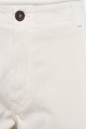 Beige katoenen broek met knoop.