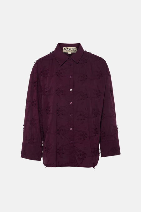 Chemise violette à manches longues de Le Fabuleux Marcel de Bruxelles, avec motif floral brodé.