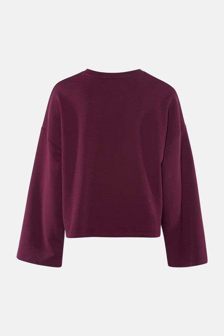 Pull uni violet à col rond de Le Fabuleux Marcel de Bruxelles, coupe ample, manches larges, vue arrière.