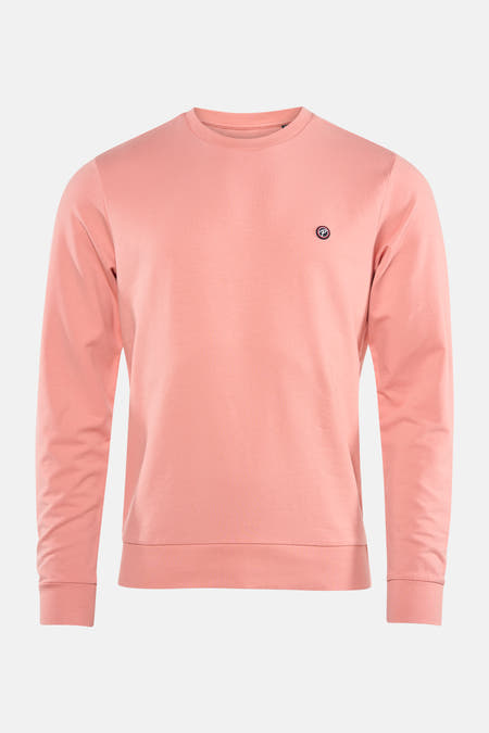 Gilet rose de Petrol Industries® avec des manches longues et un petit logo sur la poitrine.