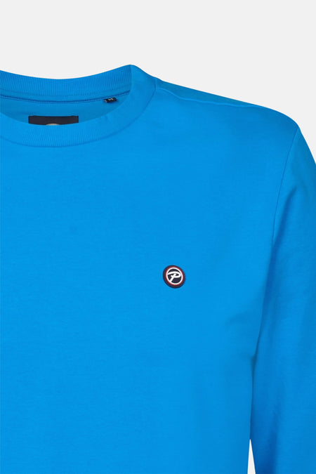 Gilet bleu avec col rond de Petrol Industries, avec petit logo sur la poitrine.