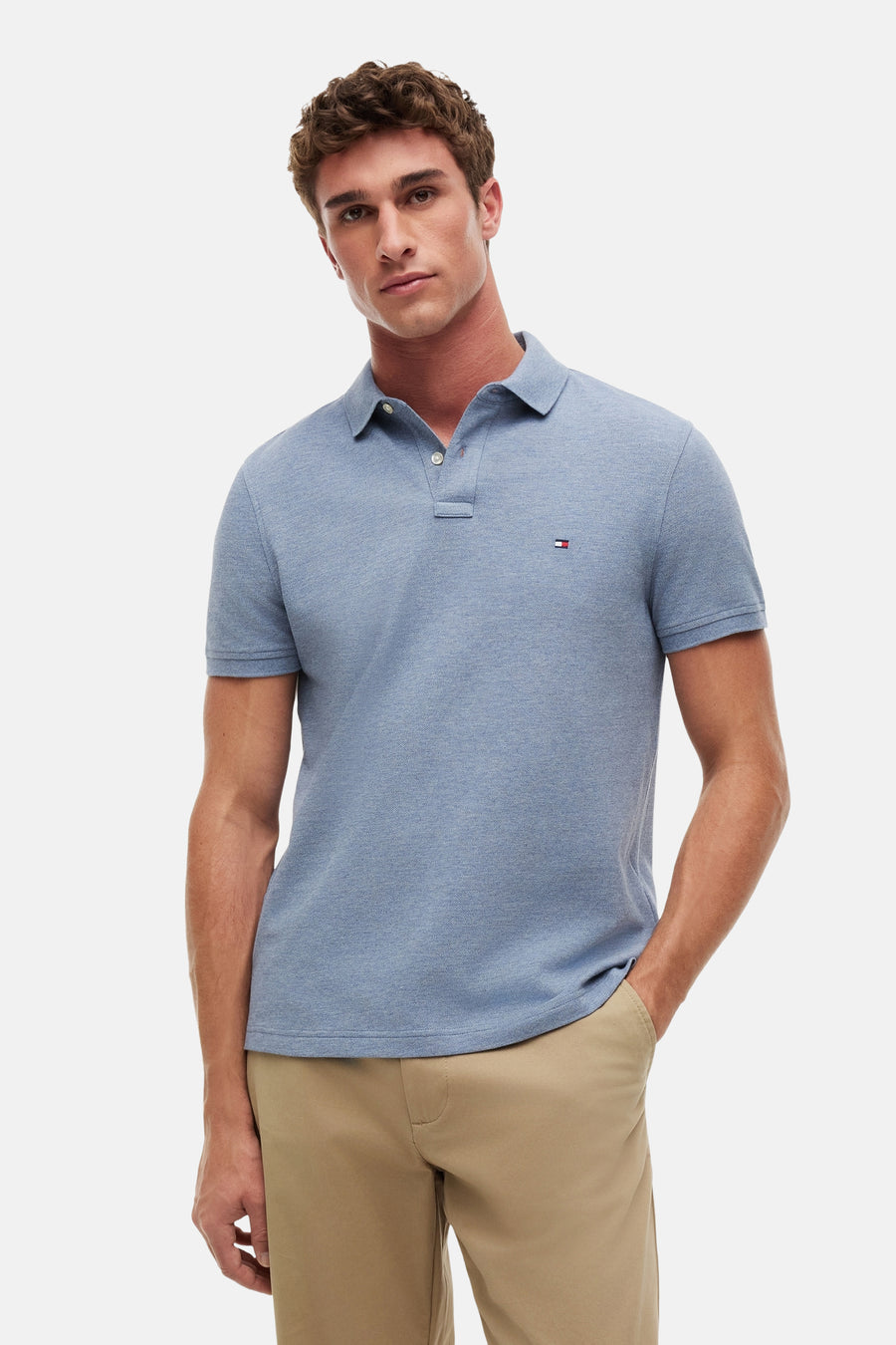 Polo piqué bleu de TOMMY HILFIGER avec col classique et logo drapeau brodé.