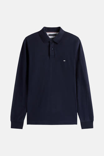 Polo bleu de TOMMY HILFIGER avec des manches longues et un logo subtil sur la poitrine.