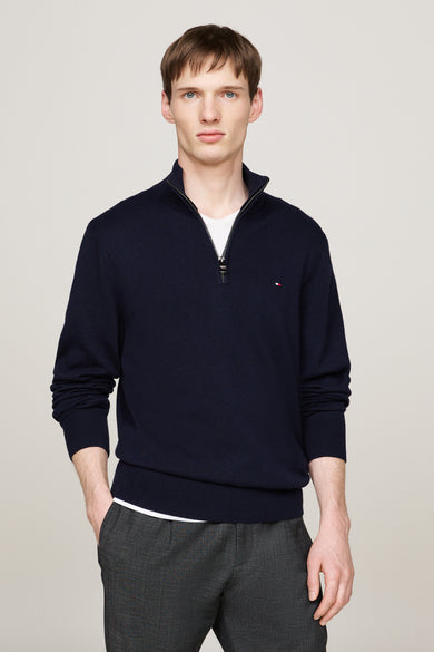 Jean TOMMY HILfiggerger Tommyilau de, bleueueueué arrière portée avec un jeans gris.
