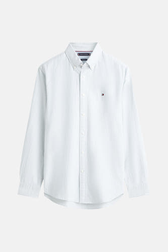 Chemise à carreaux verte de TOMMY HILFIGER, manches longues, avec un logo brodé sur la poitrine.
