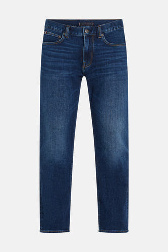 Jean denim bleu marine foncé de TOMMY HILFIGER, avec un lavage léger et des surpiqures brunes.