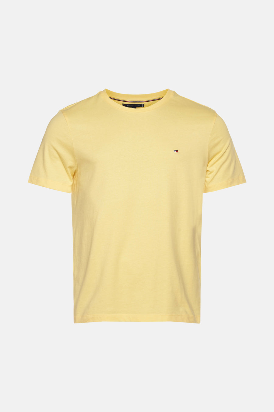 T-shirt jaune à manches courtes de Tommy Hilfiger, avec petit logo brodé sur la poitrine.