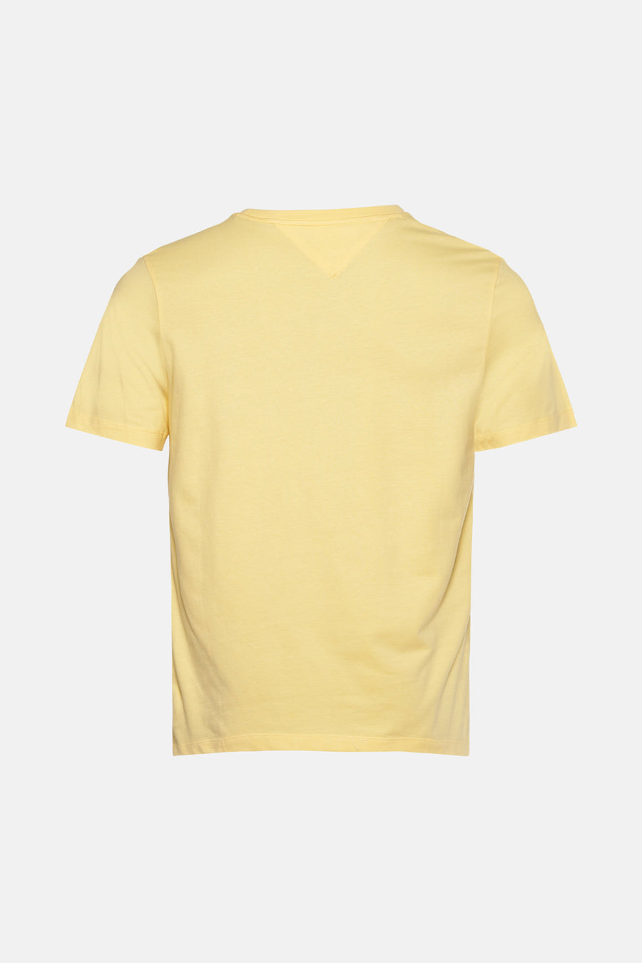 T-shirt jaune à manches courtes Tommy Hilfiger, couleur unie avec un détail en V sous l'encolure ronde.