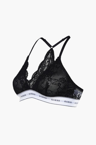 Côtés noirs en cuir de Guess, dotés d'une bande élastique blanche avec le logo de la marque.