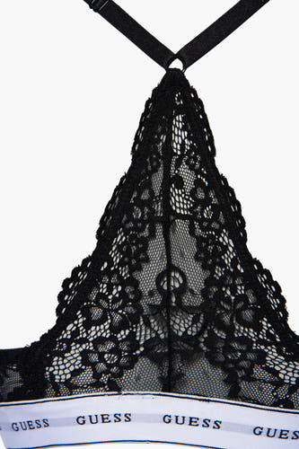Gants de noir en coton par Guess avec un motif en coton et une bande élastique.