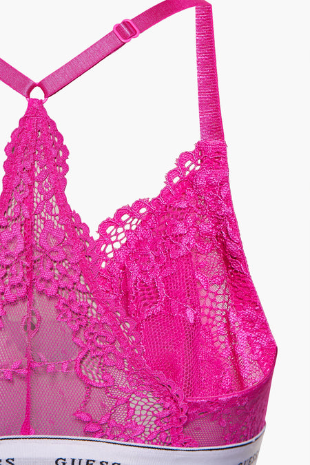 Roze beha van Guess® met bloemenkant, verstelbare bandjes en elastische band onder de borst.
