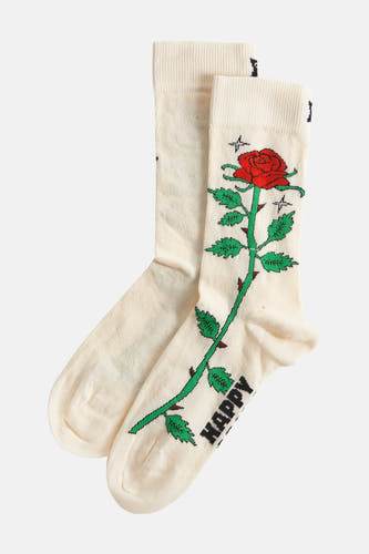 Chaussettes écru de Happy Socks avec un imprimé de roses et des tiges vertes avec des épines.