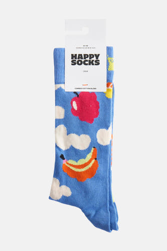 Chaussettes bleues de Happy Socks, avec des motifs de fruits comme des bananes et des pommes, sur un fond de nuages.