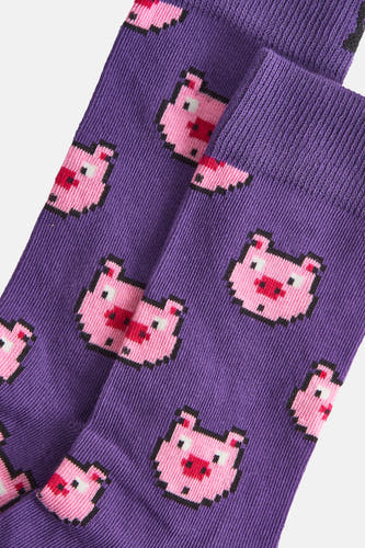 Chaussettes noires de Happy Socks® avec un motif de porc pixelisé.