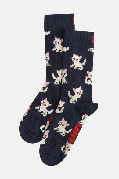 Chaussettes bleues de Happy Socks avec des chats blancs et du texte rouge.