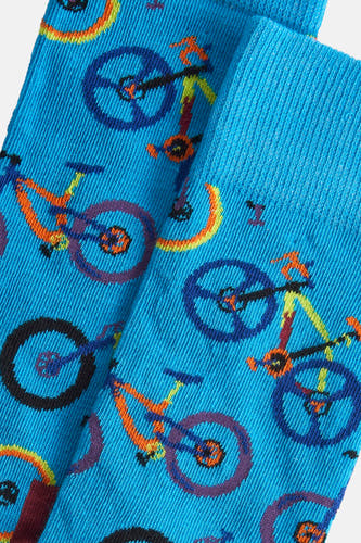 Chaussettes bleues de Happy Socks avec un motif de vélos colorés.