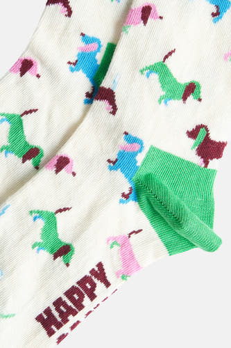 Multikleurige sokken van Happy Socks®, met een patroon van kleurrijke paarden en groene details.