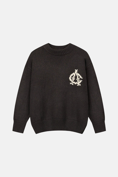 Pull marron avec col rond d'ANOTHER COTTON LAB, avec des détails décoratifs tricotés sur la poitrine.