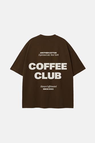 T-shirt brun avec manches courtes de ANOTHER COTTON LAB, avec le texte blanc "Coffee Club" sur le dos.