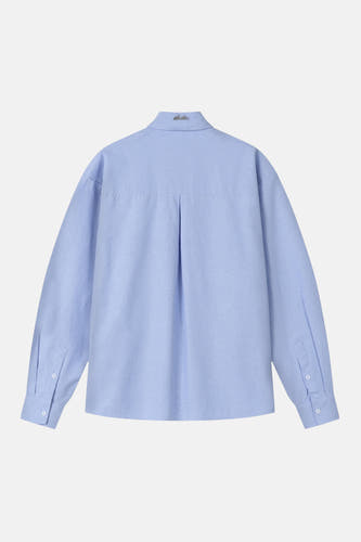 Chemise bleue à manches longues d'Another Cotton Lab, avec plis au dos et fermeture boutonnée.