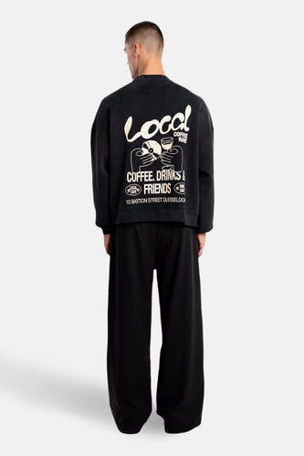 Sweat-shirt noir d'ANOTHER COTTON LAB avec imprimé graphique blanc "Local Coffee Rave" dans le dos.