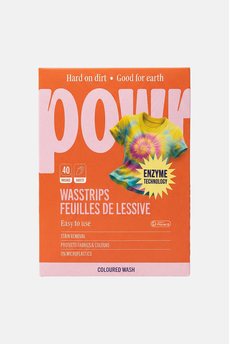Oranje wasstripsverpakking van WONDR CARE met roze accenten, tie-dye shirt, enzymtechnologie en 40 wasbeurten voor gekleurde was.