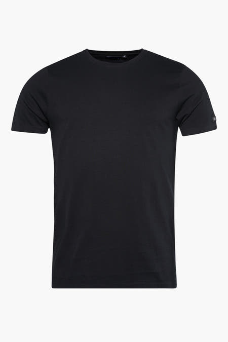 T-shirt noir à manches courtes de PRESLY & SUN, avec une petite étiquette sur la manche.