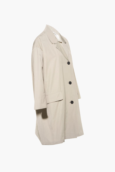 Veste verte de BROWNIE, avec des manches longues, des boutons et un col classique, présentée debout contre un fond blanc.