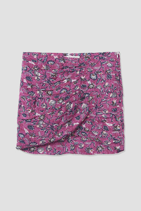 Robe courte rose de BROWNIE, avec un imprimé floral complet et un détail drapé.