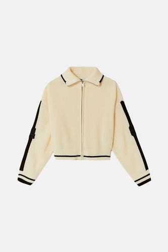 Gilet écru de TALLY WEIJL avec des rayures noires sur les manches et des détails côtelés.