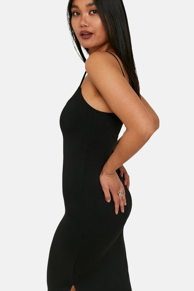 Jupe sans manches noire de TALLY WEIJL, modèle tailleur avec des fines bretelles, vue arrière.