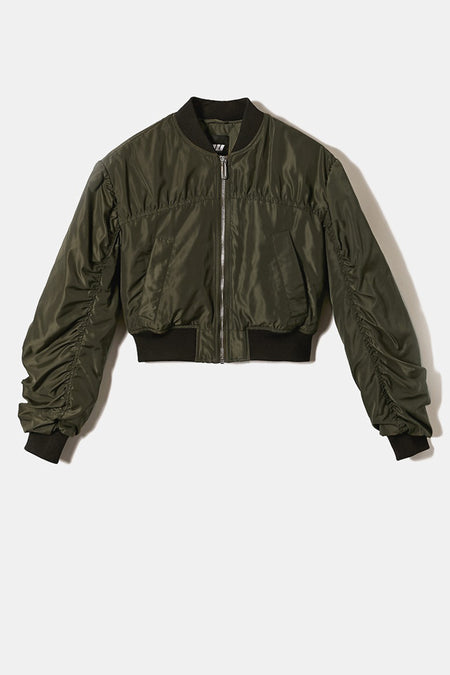 Manteau court vert de TALLY WEIJL, avec des manches froncées, une fermeture éclair et des bordures sombres.
