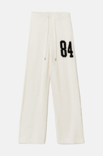 Short de jogging T TALLY WEALLL, un grande grande grande "84" le le gauche et une ceinture.