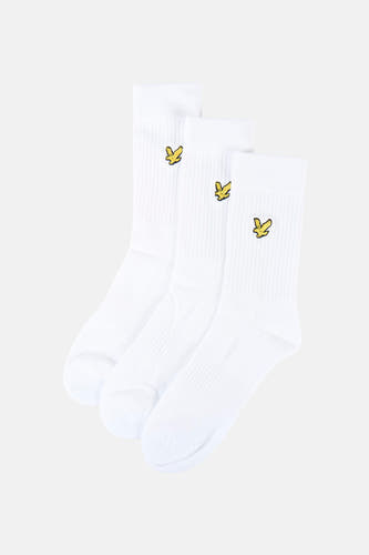 Chaussettes blanches de LYLE & SCOTT, emballées avec une bande jaune portant le logo et le texte.